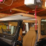 Top hanging above Jeep, from front