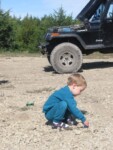Micah playing in the rocks