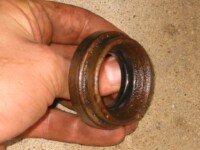 Axle seal, outboard surface