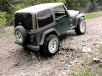 The wounded TJ climbing the mini-ledge at the top