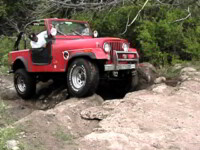 CJ trying in vain to flex
