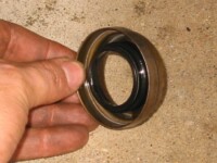 Axle seal, inboard surface