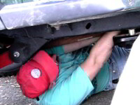 Bob finds his yoga positions useful for Jeep repair