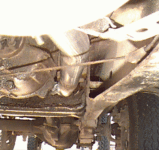 Pipe between frame and t-case, from rear