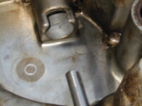 Worn spot from end of cam