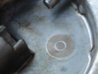 Worn spot from end of cam