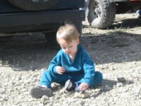 Micah playing in the rocks