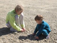 Sheridan & Micah playing in the rocks