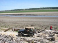 Ben playing by the lake
