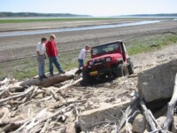 Zack playing by the lake