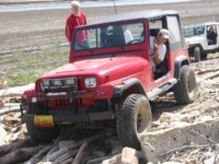 Zack playing by the lake