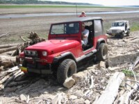 Zack playing by the lake