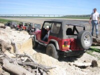 Zack playing by the lake