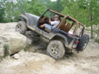 Ben climbing the ledge in the quarry