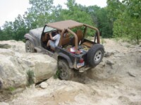 Ben denting his rocker panels in the quarry