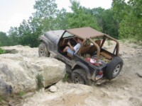 Ben denting his rocker panels in the quarry