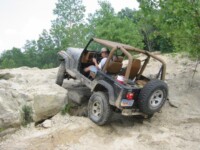 Ben climbing the ledge in the quarry
