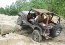 Ben climbing the ledge in the quarry