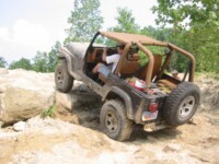 Ben climbing the ledge in the quarry