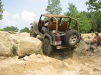 Dave watching Ben climb the ledge in the quarry